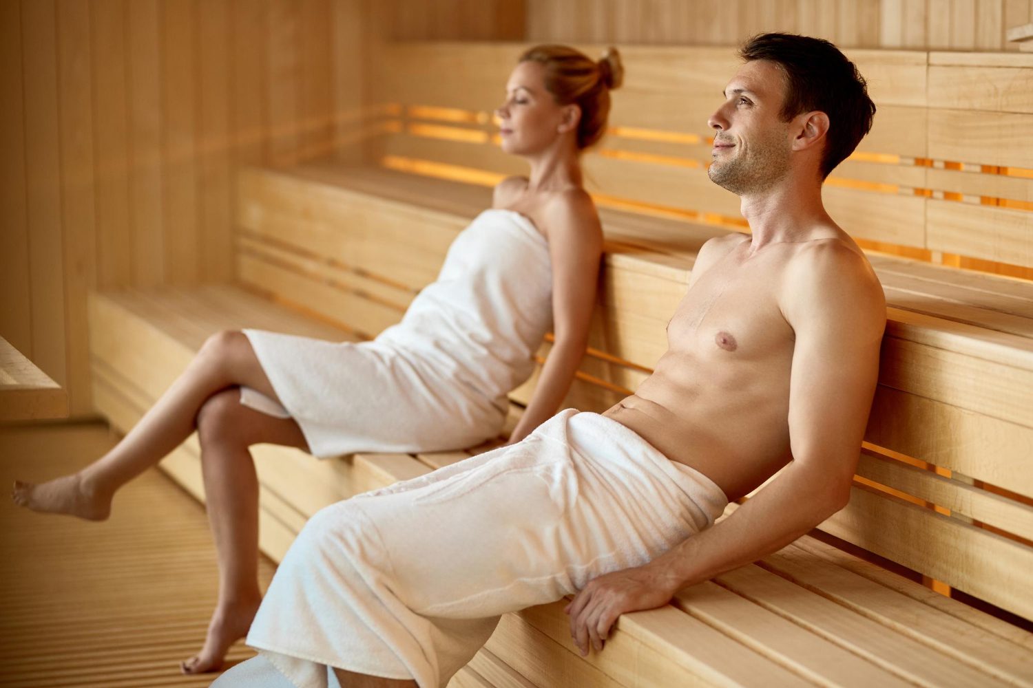 couple relaxing in sauna