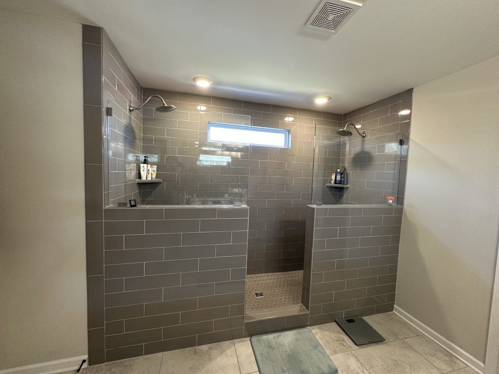 Bathroom with shower and walk-in shower