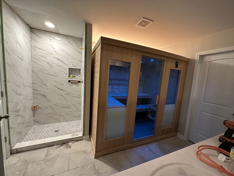 spa-like bathroom with a sauna and a spacious shower