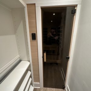 white closet with glass door